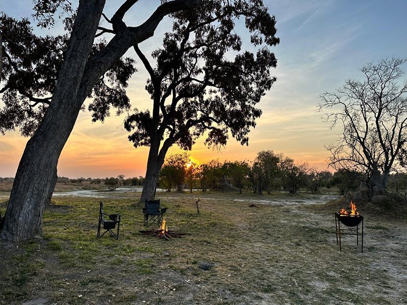 Canvas safari tent lit at dusk